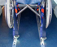 Wheelchair tie down system